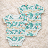 Monstera Tiare Plumeria Lei Pattern Baby Onesie Teal Version
