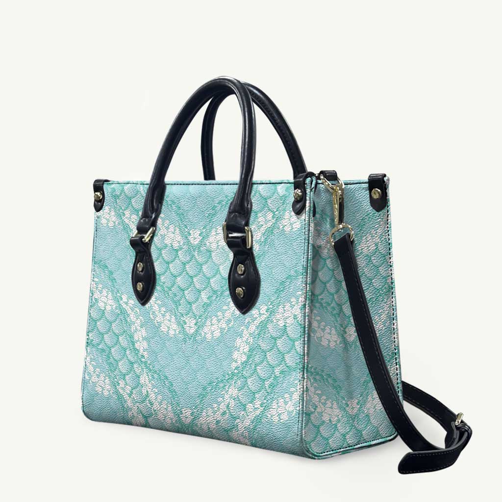 Light Turquoise Mermaid Puakenikeni Maile Lei Leather Bag