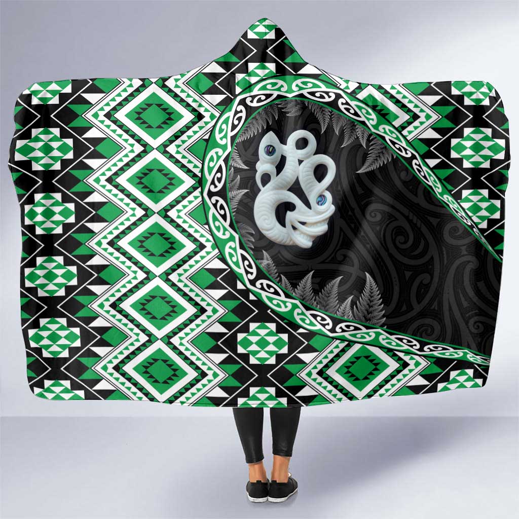 Green Taniko Motif Aotearoa Manaia and Silver Fern Hooded Blanket