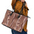 Hawaii Maile Lei Leather Tote Bag With Brown Monstera Pattern