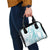 Polynesia Plumeria Lei Shoulder Handbag White Turquoise Curves Motif