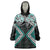 Turquoise Aotearoa Tukutuku Manawa Tapu Wearable Blanket Hoodie Ta Moko Toi Maori