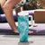 Teal Polynesia Hammerhead Shark Tattoo With Plumeria Lei Tumbler With Handle