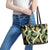 Black Hawaii Plumeria Lei With Tropical Leaves Leather Tote Bag