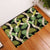 Black Hawaii Plumeria Lei With Tropical Leaves Rubber Doormat